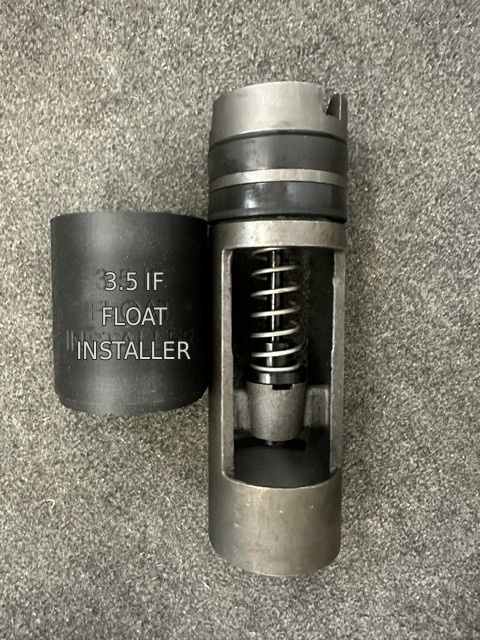 Float Installer beside the exposed float valve, showing the 3½ IF model marking